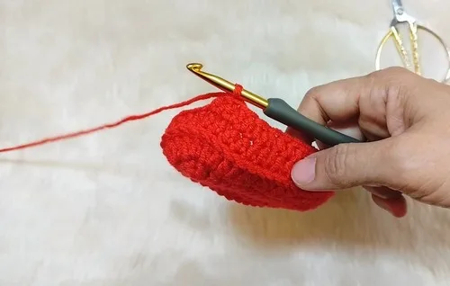 Slip-stitch sole crochet booties with pompom trim — photo 2
