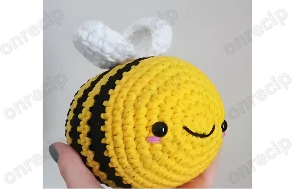 Amigurumi bumble bee with a 24-round striped body