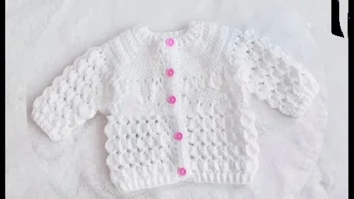 Marshmallow stitch baby cardigan with a fan-stitch hem — photo 3