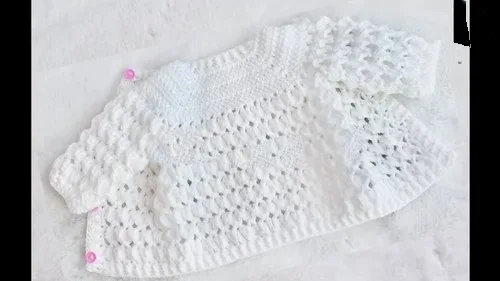 Marshmallow stitch baby cardigan with a fan-stitch hem — photo 4